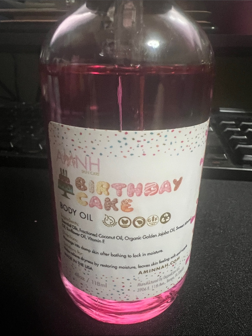AMINNAH Birthday Cake Scented Body Oil — Pink